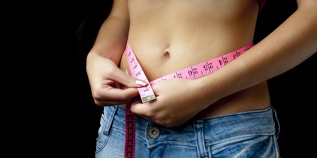 image showing a women hip measuring with a tape 