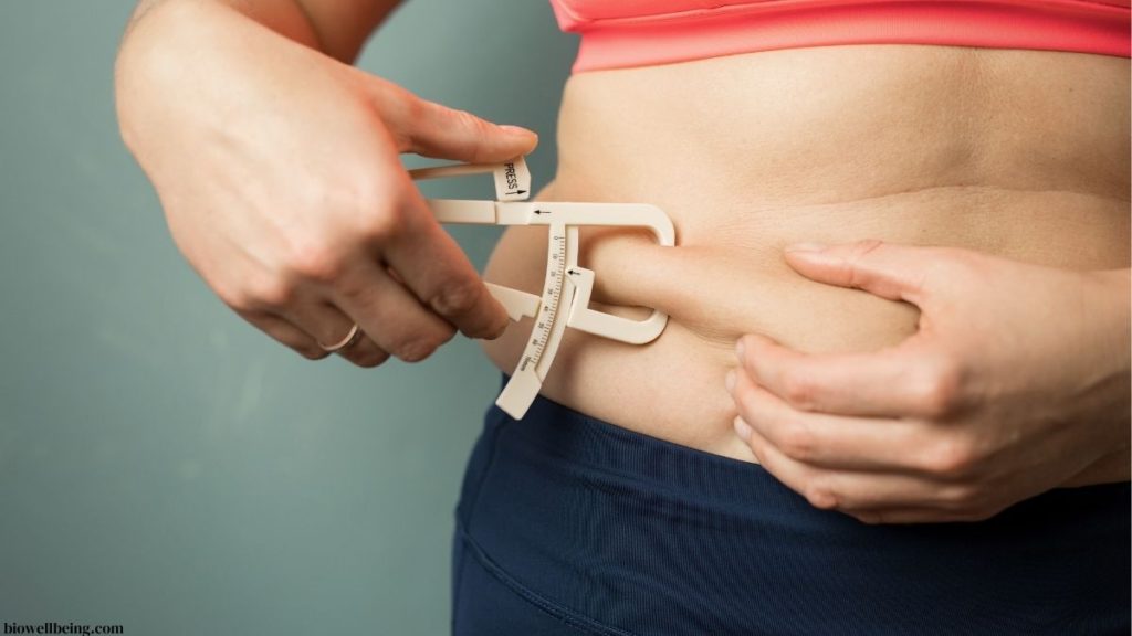 image showing women measuring body BMI.