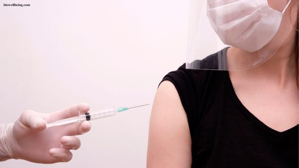 image showing women getting covid-19 jab vaccine