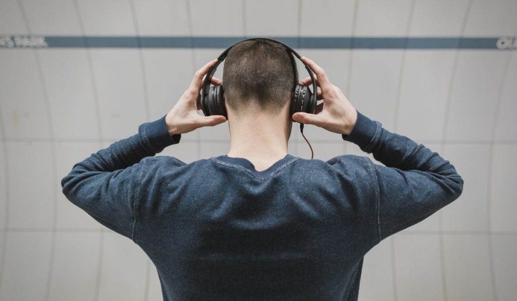 image showing a man enjoying music